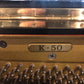 Kawai K-50 2nd hand upright piano. Kawai factory refurb. program.
